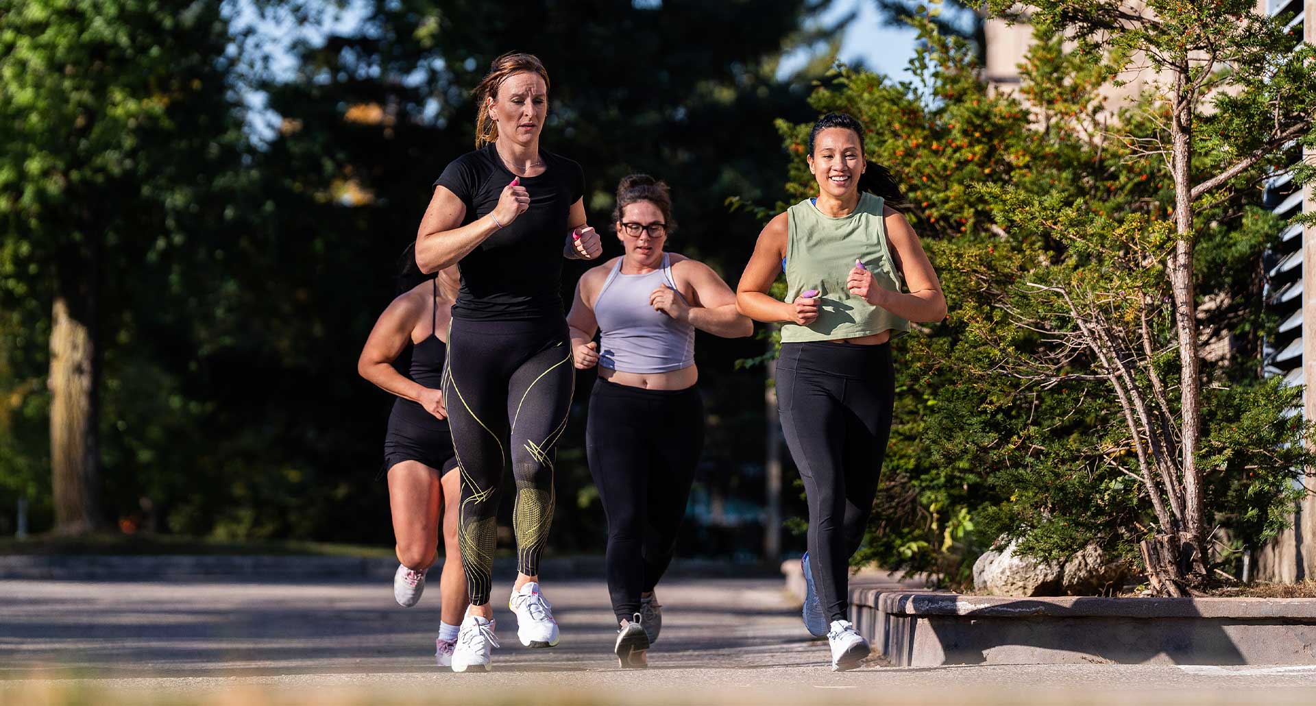 Group of women running on hyrox training